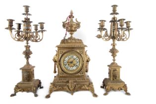 Garniture in gilt bronze with caryatids. Charles X style, 19th century