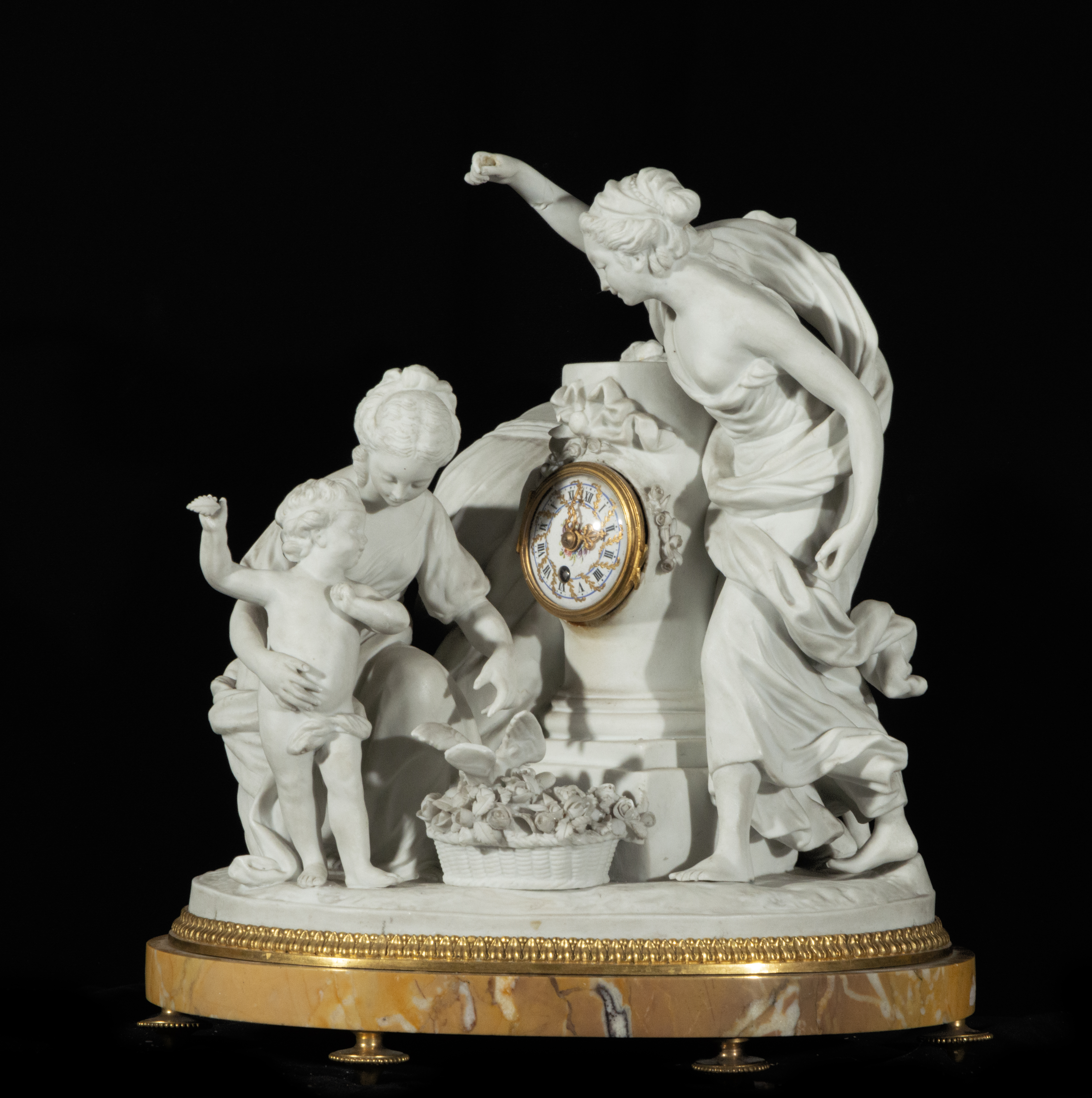 Elegant Louis XVI table clock in Siena marble, gilt bronze, and biscuit porcelain from Sèvres, late 