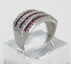 white gold ringof18 kt with rubies
