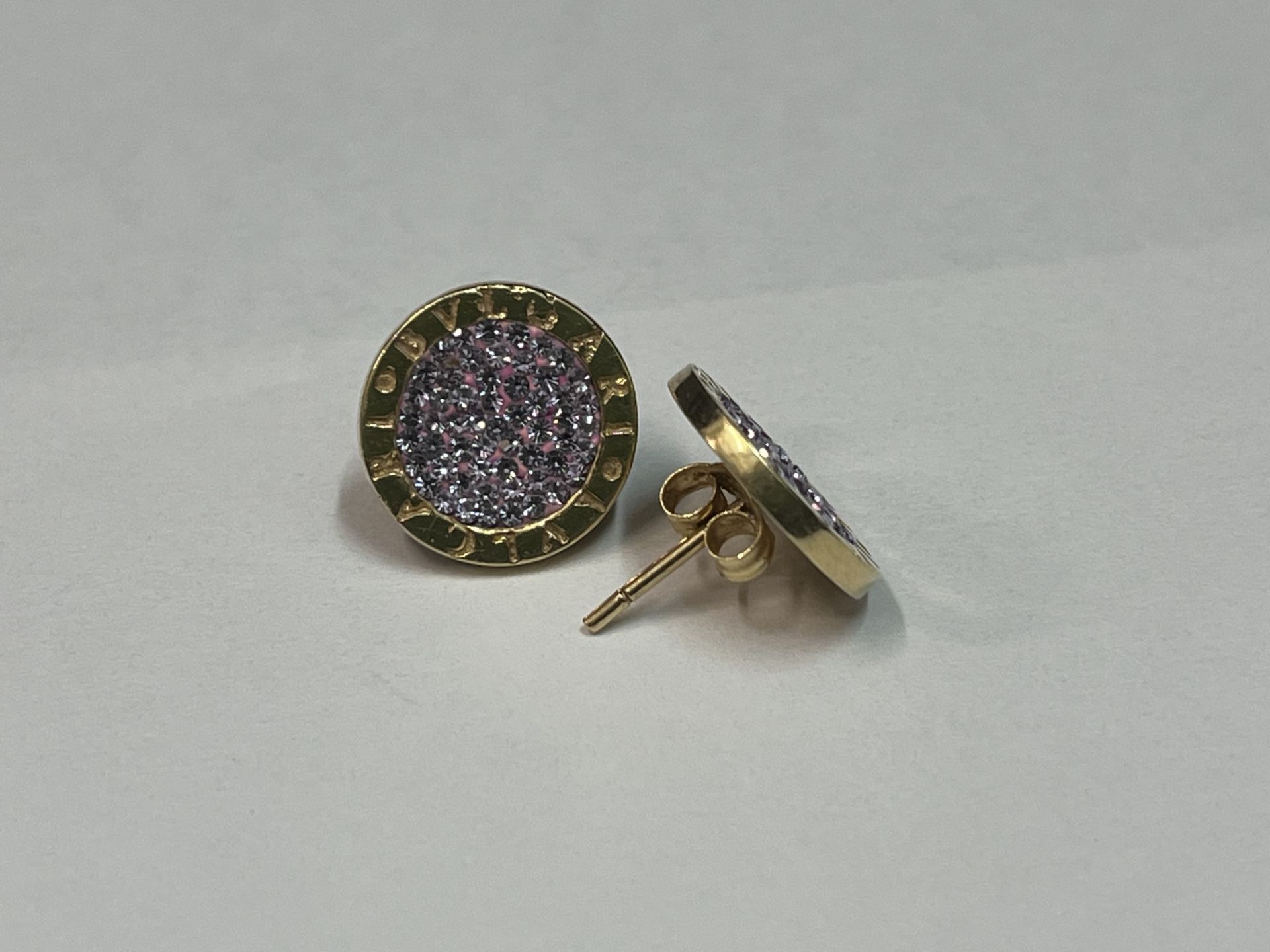 Pair of circular 18k gold and enamel oval earrings