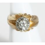 18 kt gold solitaire with diamond.