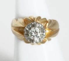 18 kt gold solitaire with diamond.