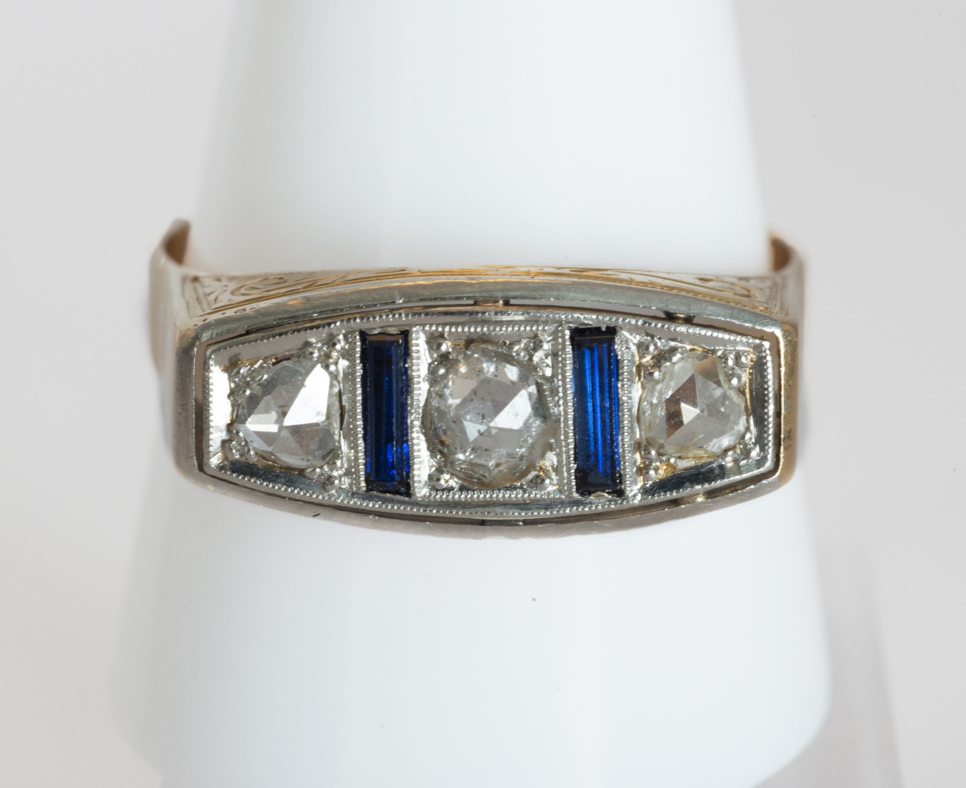 18 kt gold triplet of sapphires and diamonds.