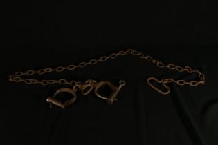 Handcuffs with shackles for prisoner or slave, Colonial India, 19th century