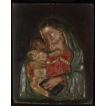 Wood relief of Virgin with Child in arms. Italian School of the 16th to early 17th centuries