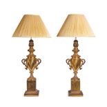 A pair of gilt brass table lamps