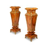 A pair of French Louis XV style walnut and gilt-bronze mounted pedestals
