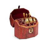 An 18th century French Louis XVI embossed red leather and gilt cutlery box containing gilded cutlery