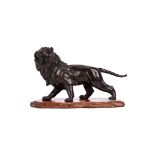 A late 19th century Chinese patinated bronze lion