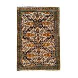A Qum silk rug of Seychour design, Central Persia