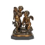 A 19th century French patinated bronze figural group of a pair of winged putti, manner of Clodion