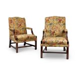A pair of late 19th century George III style mahogany Gainsborough chairs