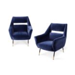 A pair of 1950's Italian lounge chairs, attributed to Minotti,