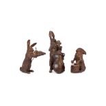 A trio of early 20th century patinated bronze hare musicians attributed to Franz Bergmann