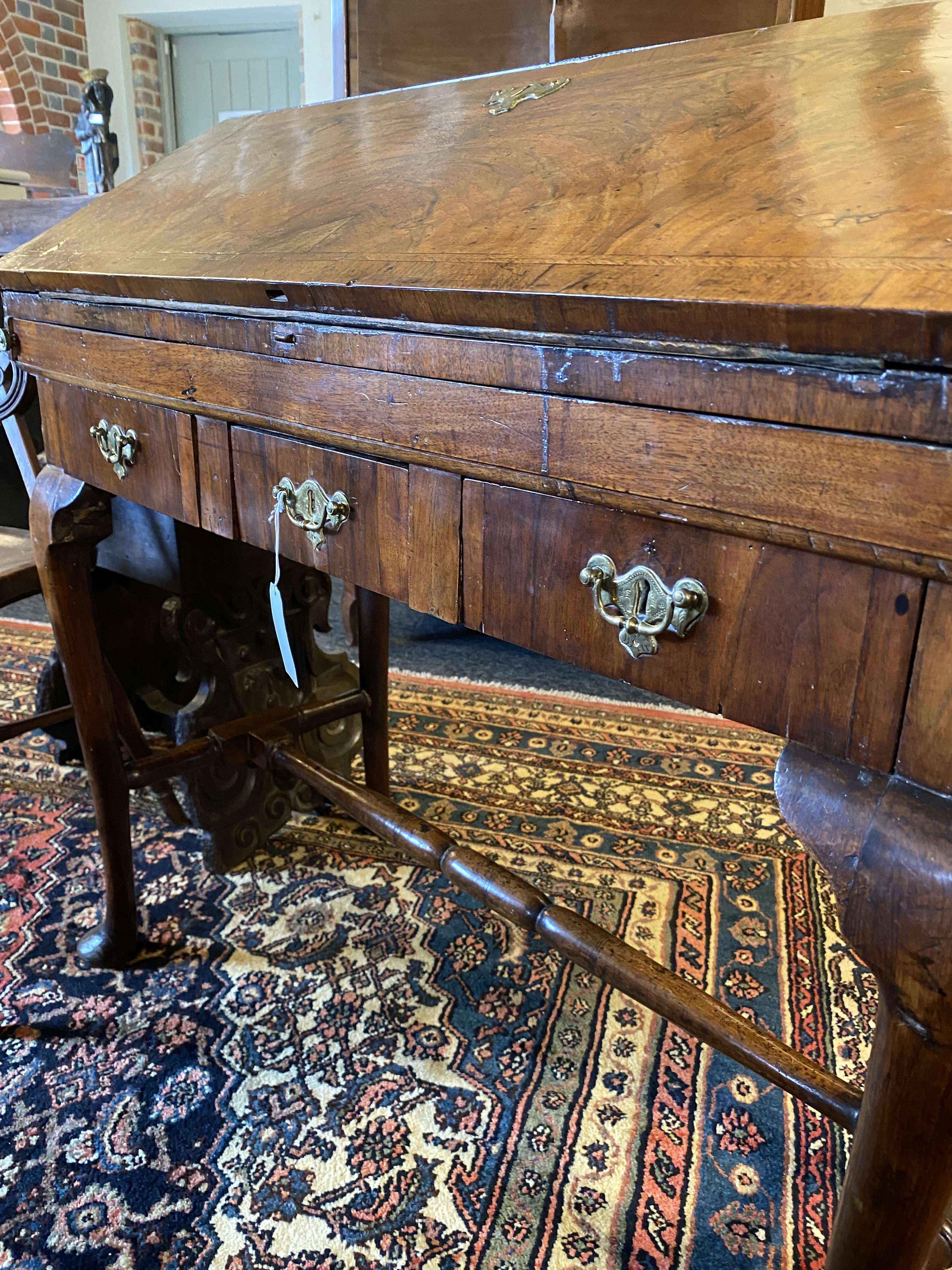 A walnut crossbanded and featherbanded bureau - Image 15 of 21