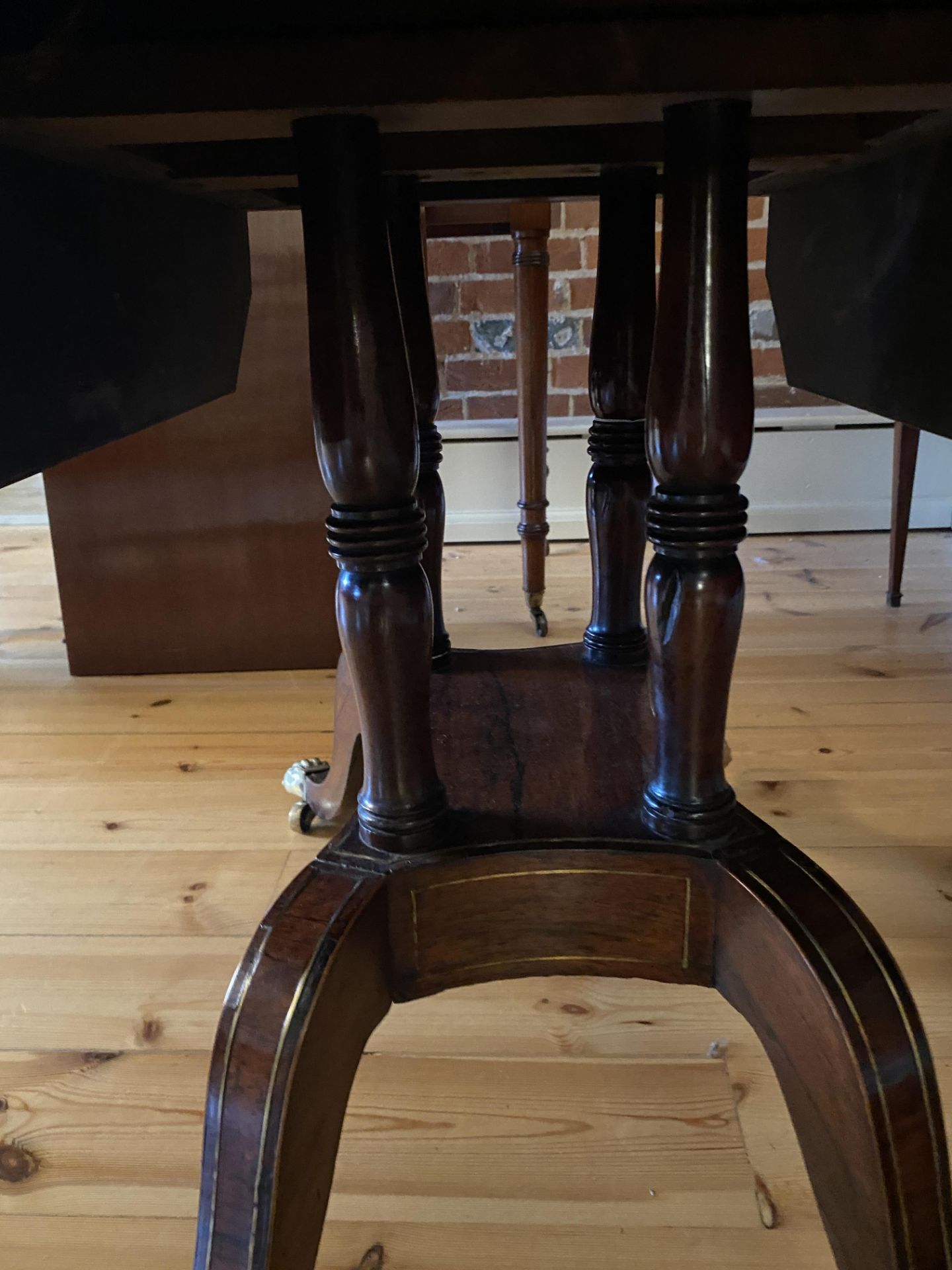 A Regency rosewood and brass inlaid drop leaf table - Image 7 of 11