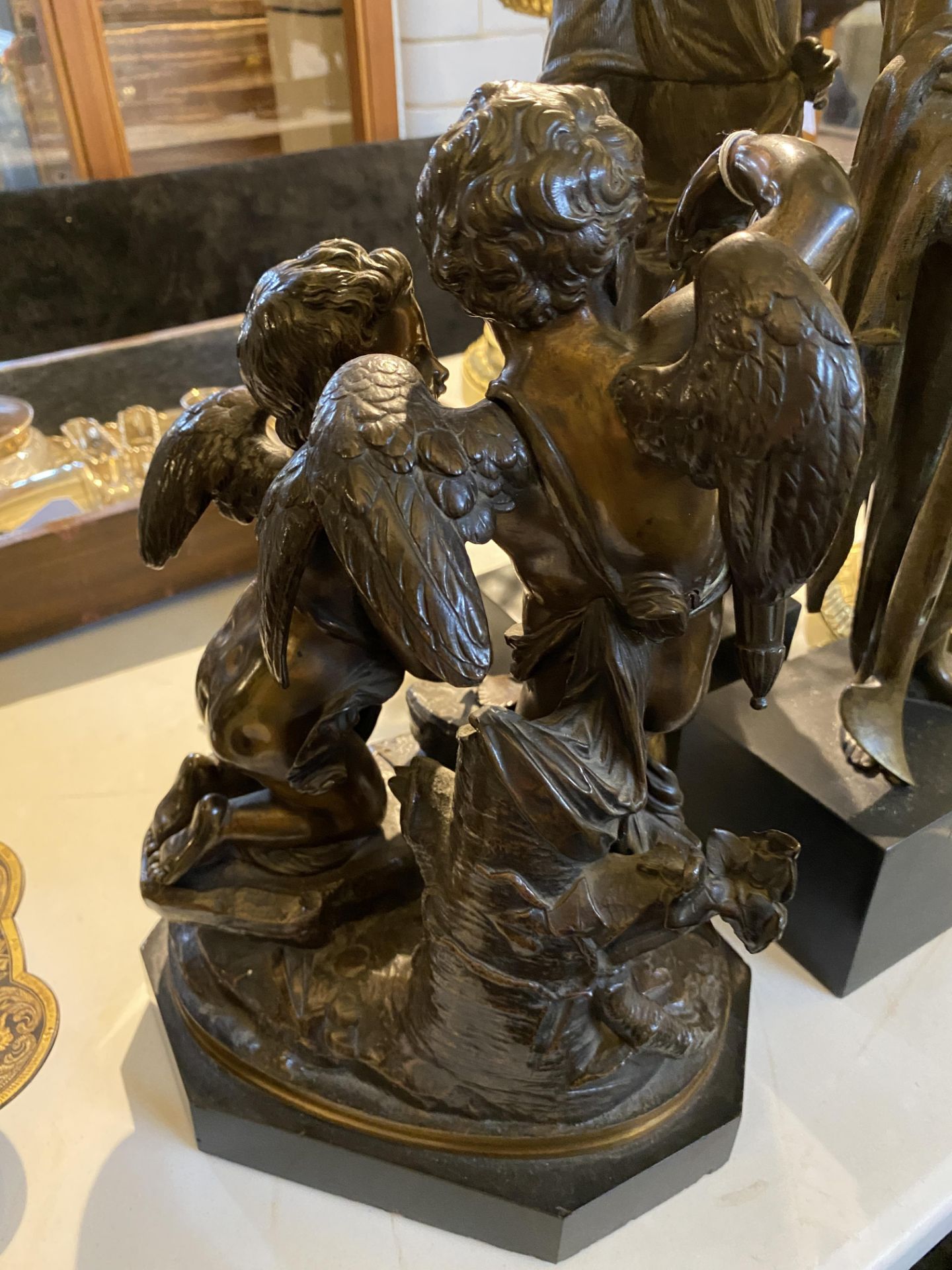 A 19th century French patinated bronze figural group of a pair of winged putti in the manner of Clod - Image 7 of 9