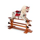 A vintage dappled grey carved rocking horse by Collinsons