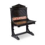 A Victorian Aesthetic Movement ebonised hall seat