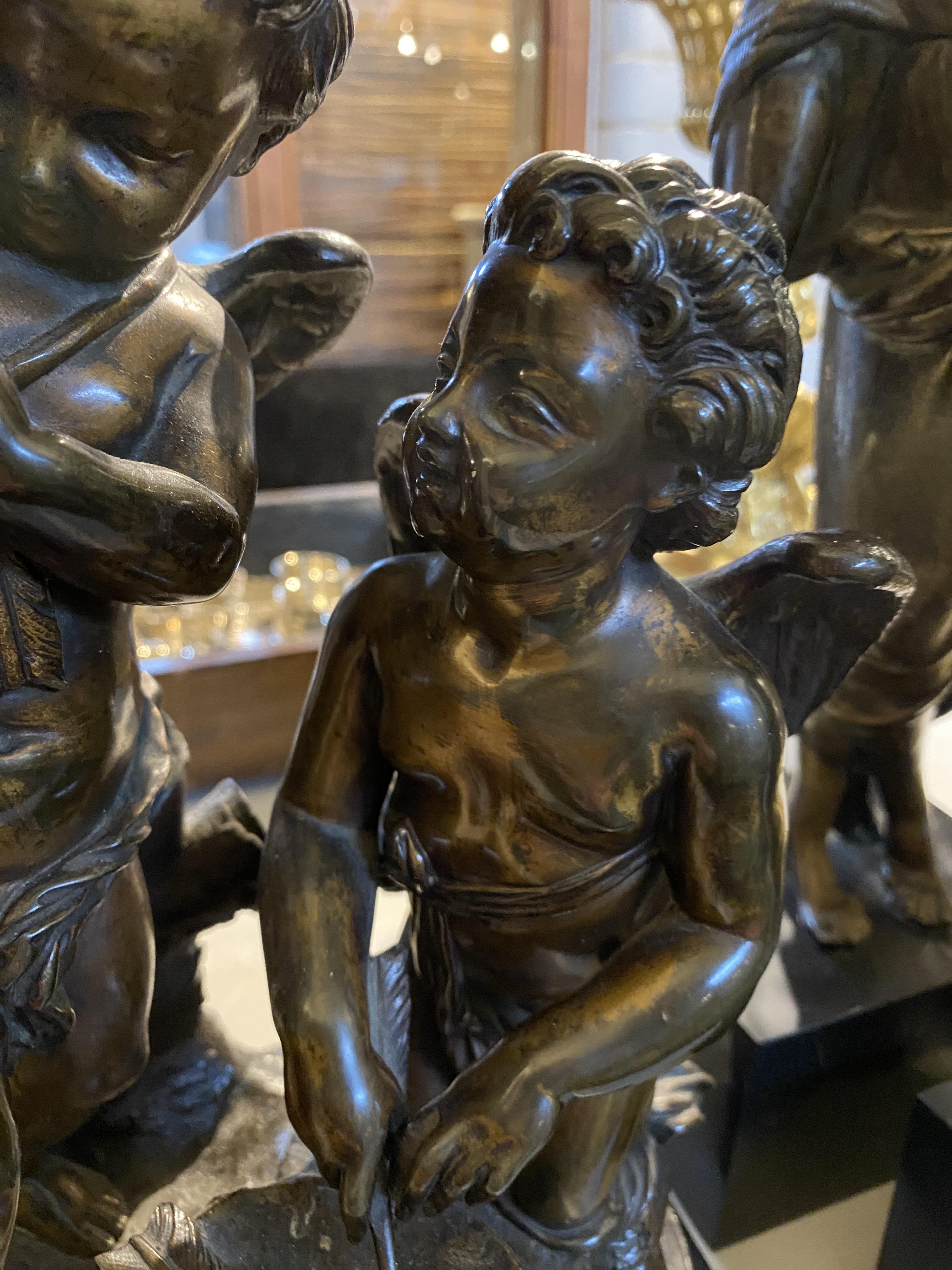 A 19th century French patinated bronze figural group of a pair of winged putti in the manner of Clod - Image 4 of 9