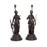 A pair of late 19th century spelter figural table lamps modelled as Diana
