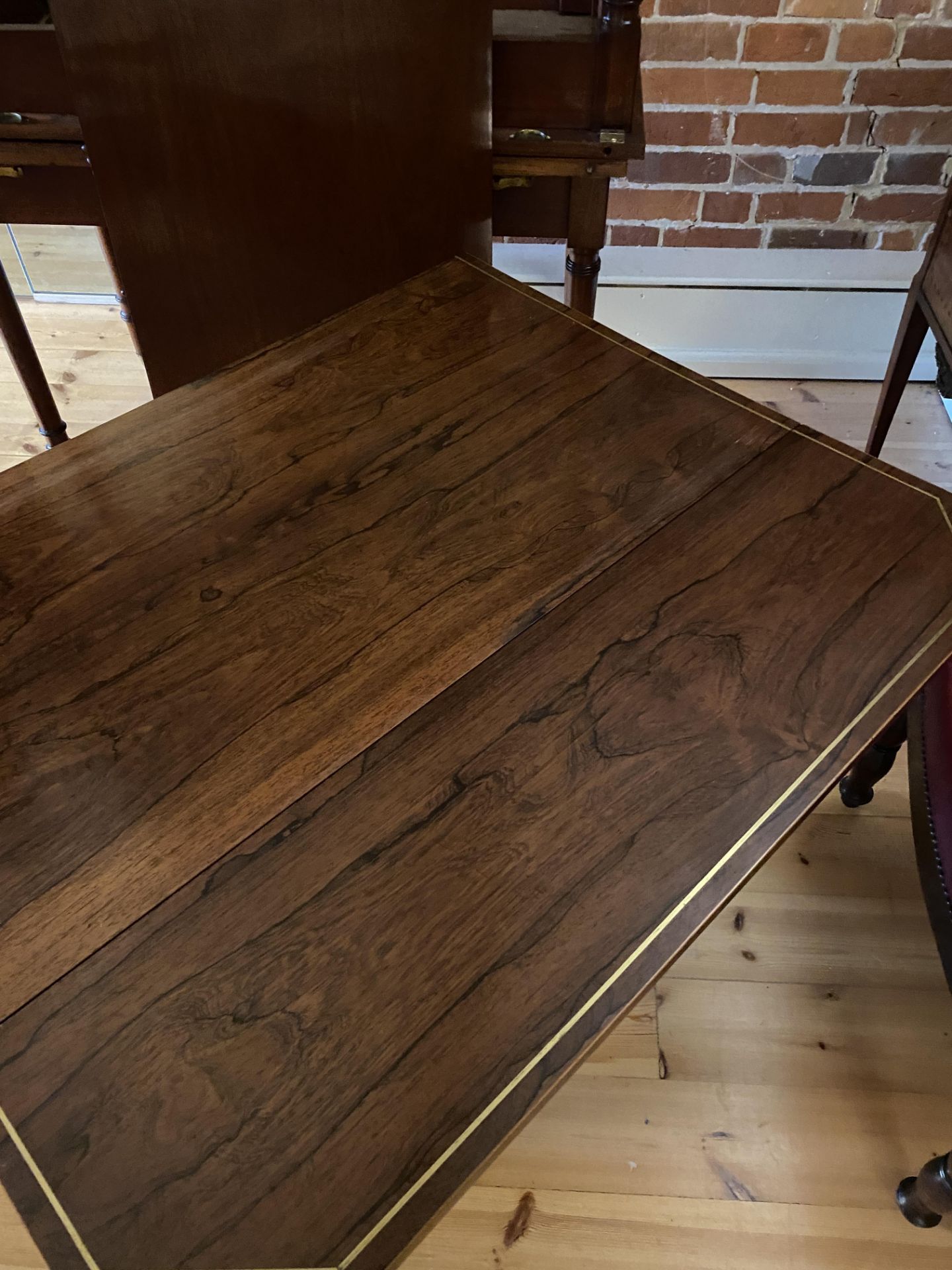 A Regency rosewood and brass inlaid drop leaf table - Image 8 of 11