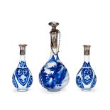 A small pair of Chinese Kangxi blue and white bottles with Turkish silver mounts and another