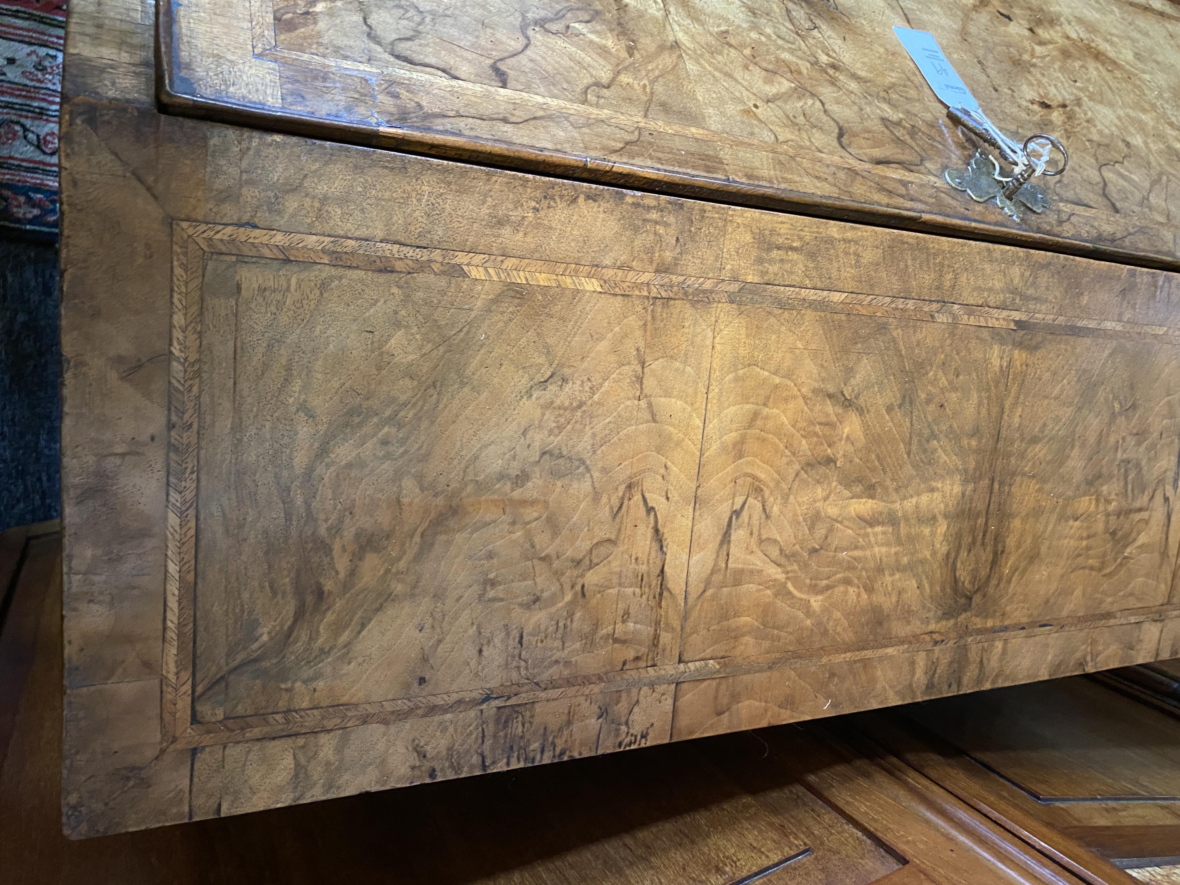 A George II walnut and featherbanded bureau - Image 11 of 33