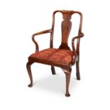 A George I walnut open armchair