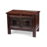 A small late 17th century oak carved chest