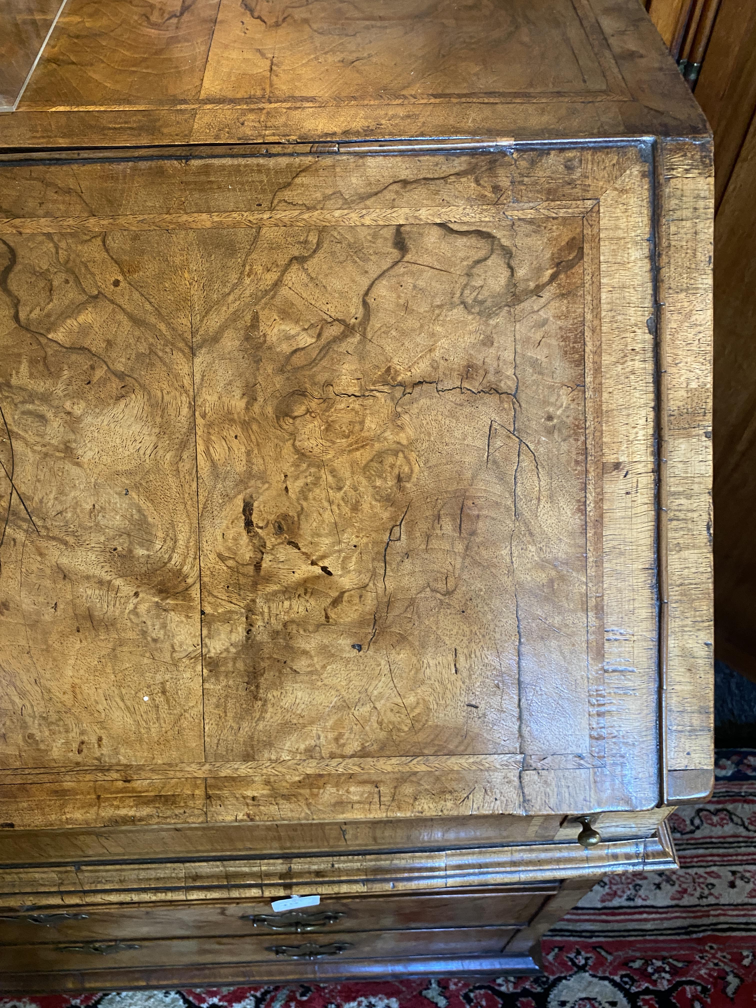 A George II walnut and featherbanded bureau - Image 4 of 33