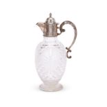 An Edwardian cut glass and silver mounted ewer