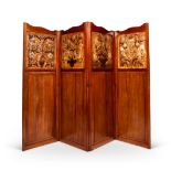 A late Victorian Arts and Crafts walnut and embossed leather four-fold screen