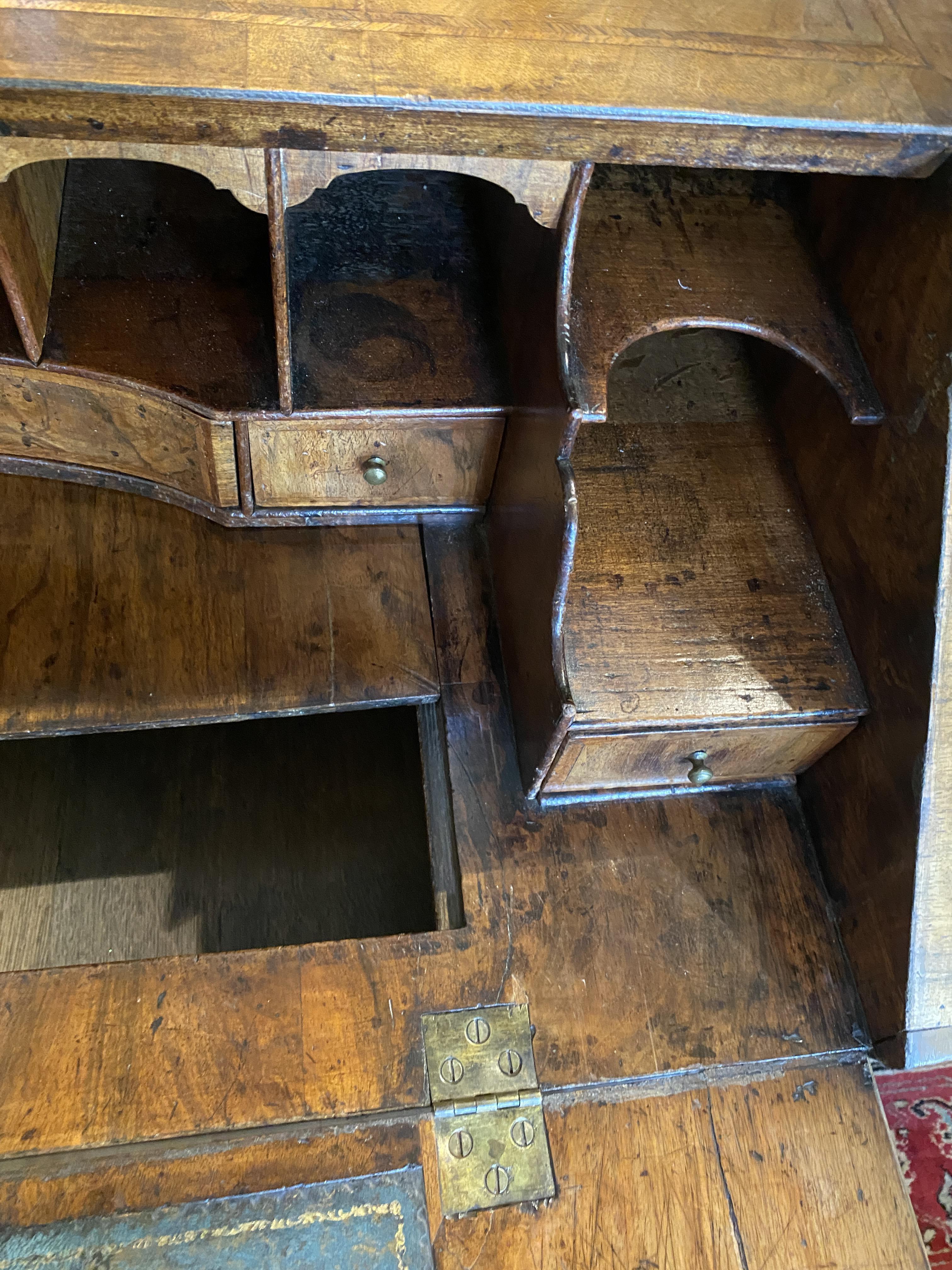 A George II walnut and featherbanded bureau - Image 19 of 33