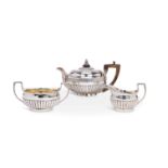 A matched George III three-piece silver tea set, London 1808