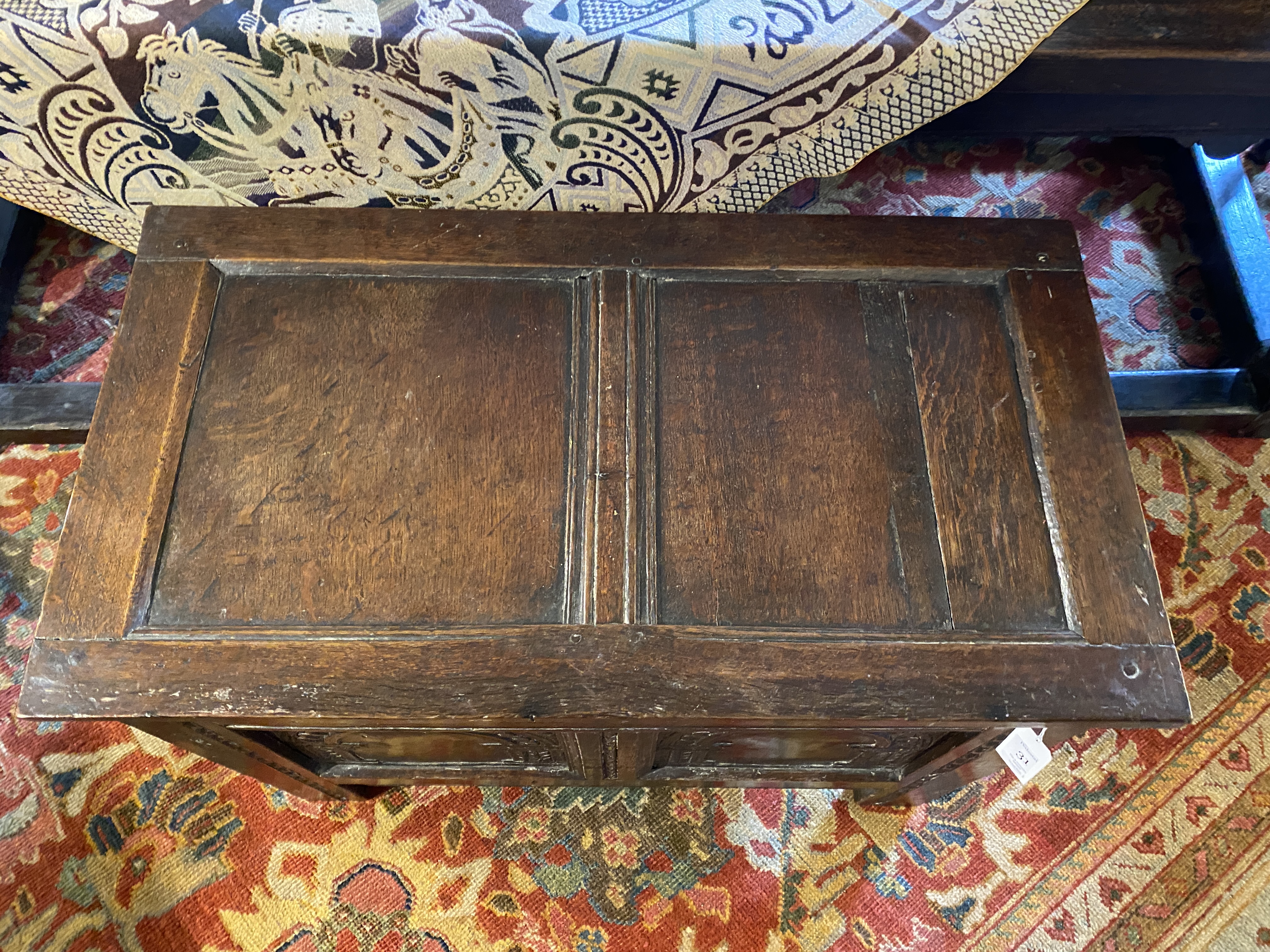 A small late 17th century oak carved chest - Image 3 of 12