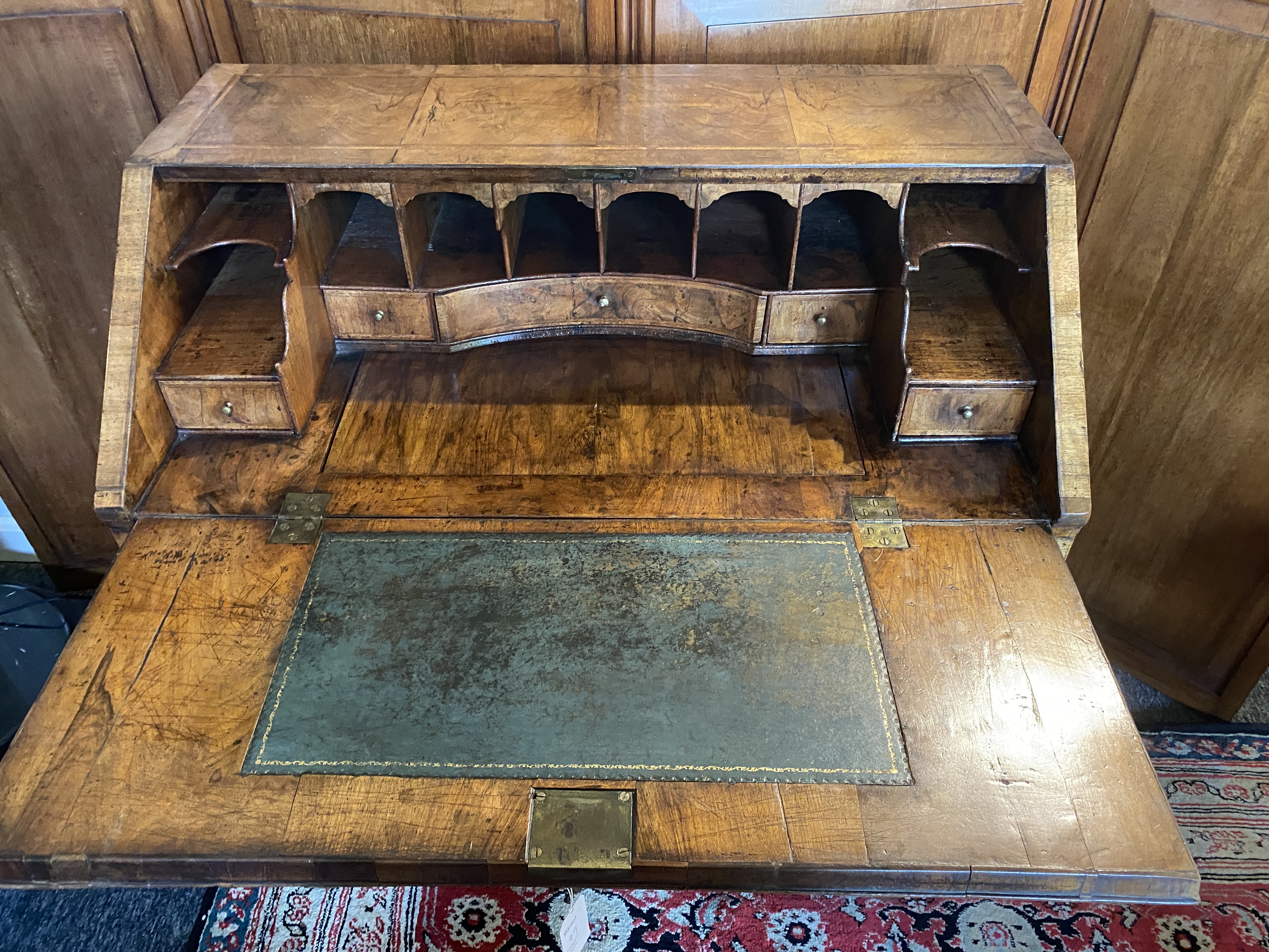 A George II walnut and featherbanded bureau - Image 17 of 33