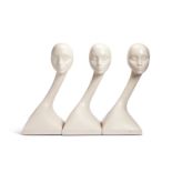 A set of three vintage fibre-glass swan-neck mannequin display heads in the manner of Seba