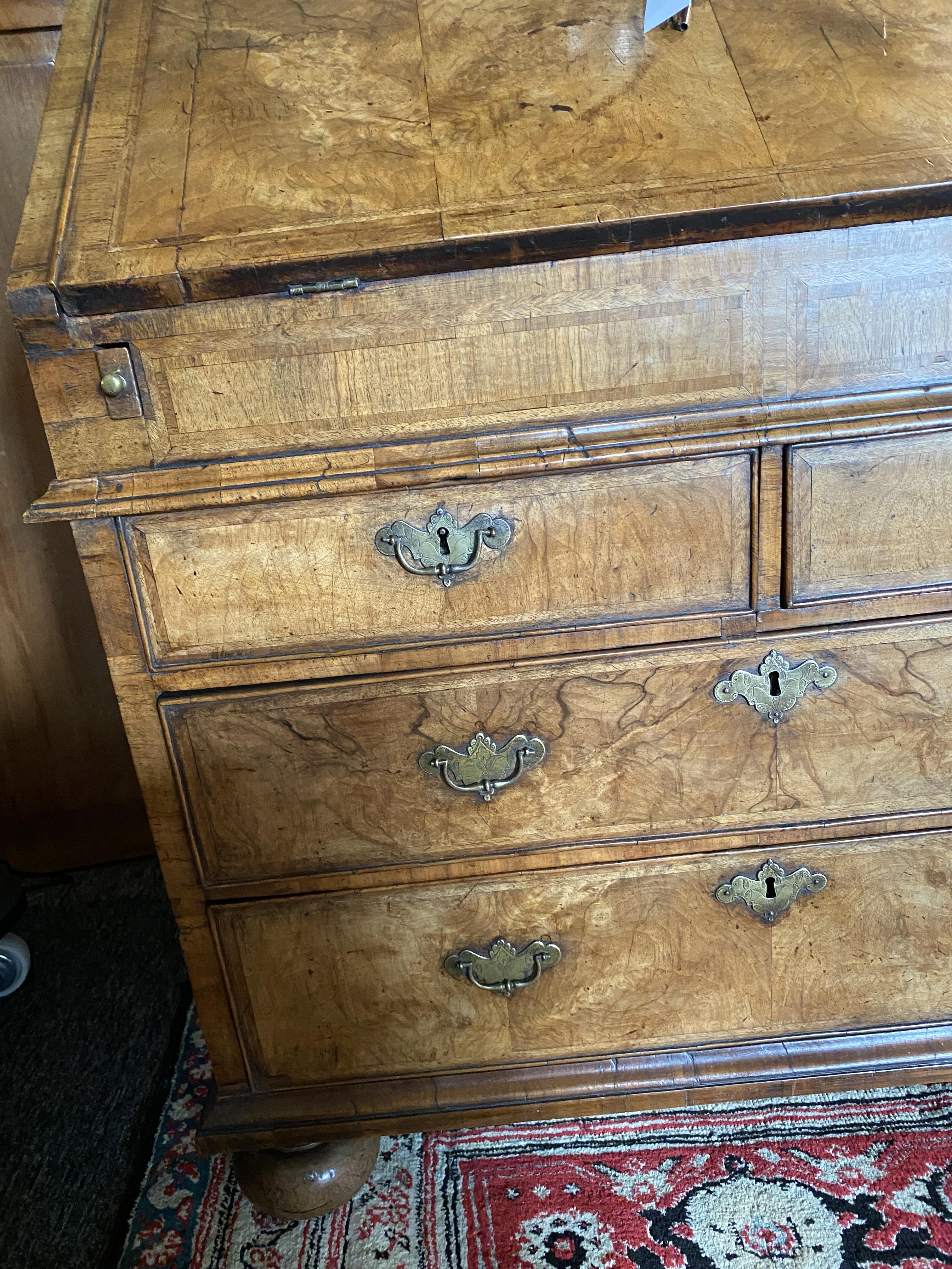 A George II walnut and featherbanded bureau - Image 32 of 33