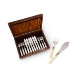 An oak cased set of six silver and mother of pearl handled fish knives and forks, and a pair of silv