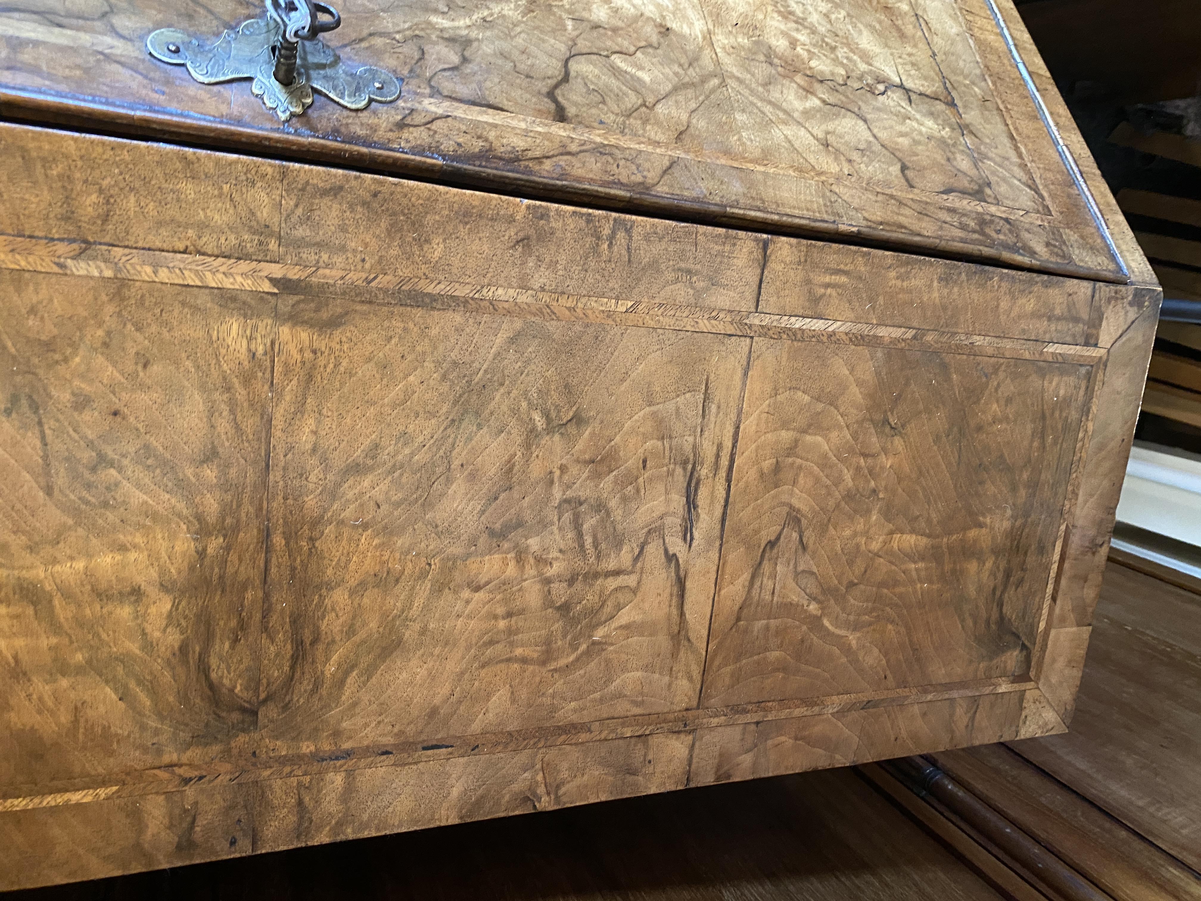 A George II walnut and featherbanded bureau - Image 13 of 33