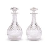A pair of Regency cut glass decanters