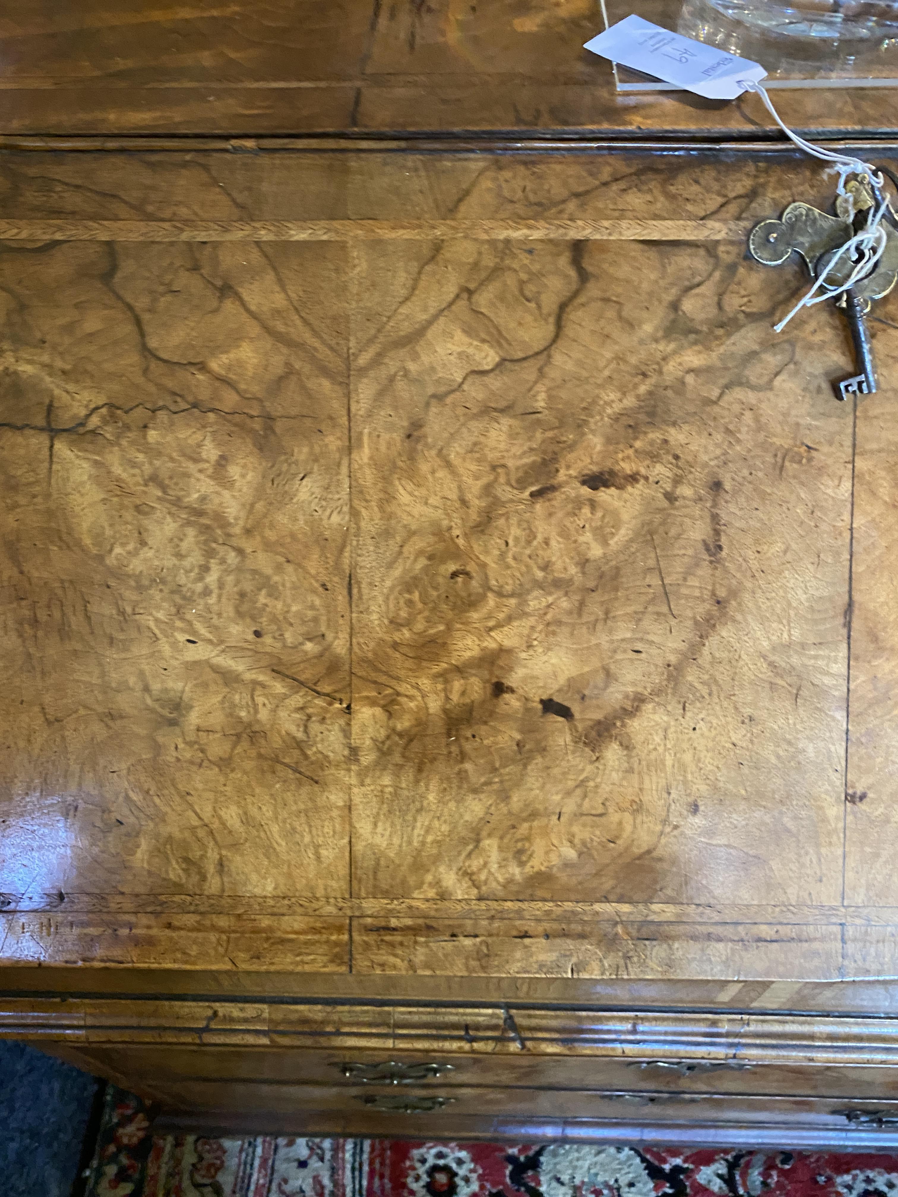 A George II walnut and featherbanded bureau - Image 6 of 33