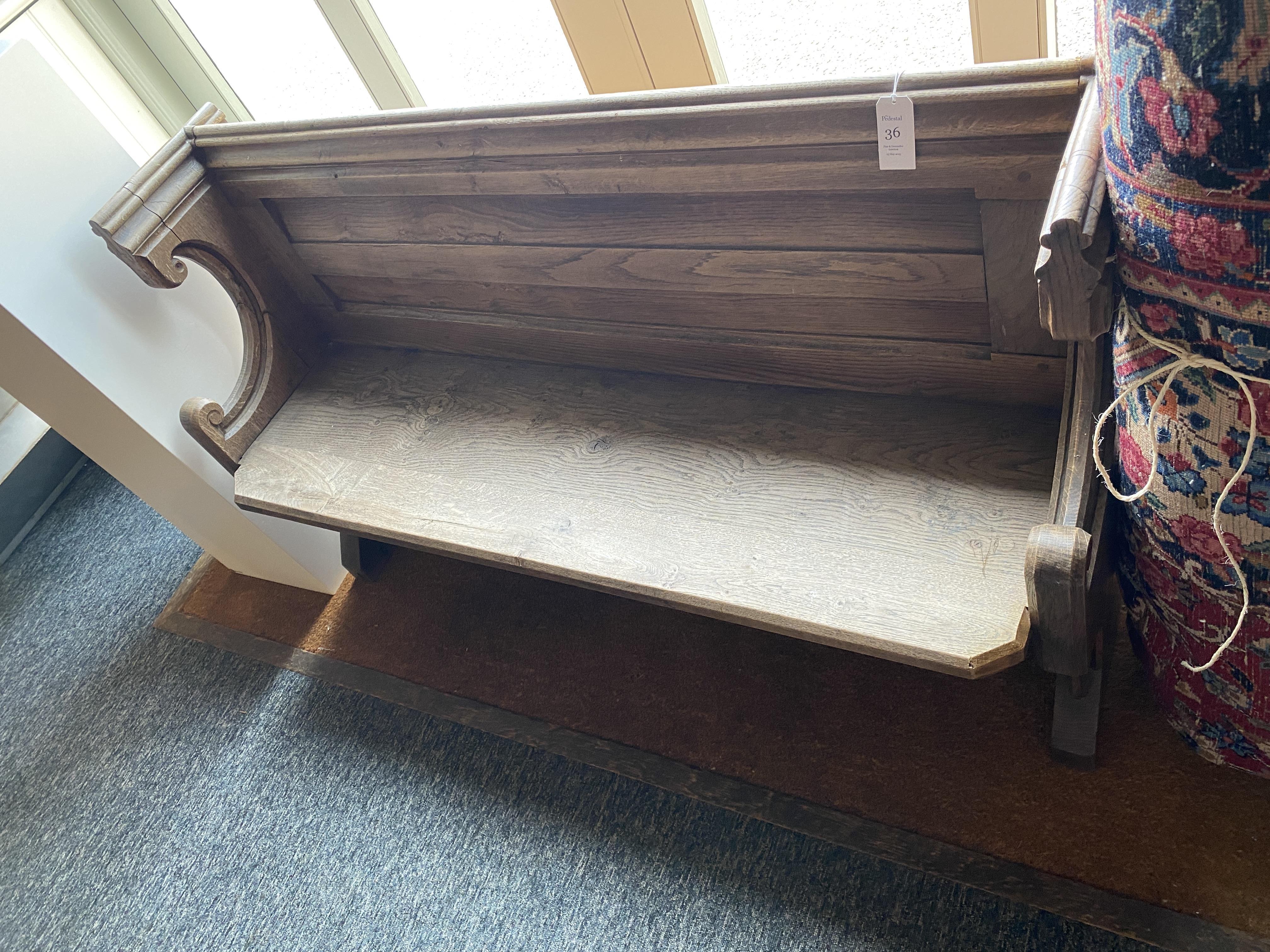 A small oak carved hall bench - Image 2 of 9