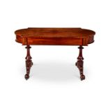 A George IV mahogany library table in the manner of Gillows