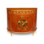 A Sheraton revival satinwood and polychrome decorated demi-lune commode