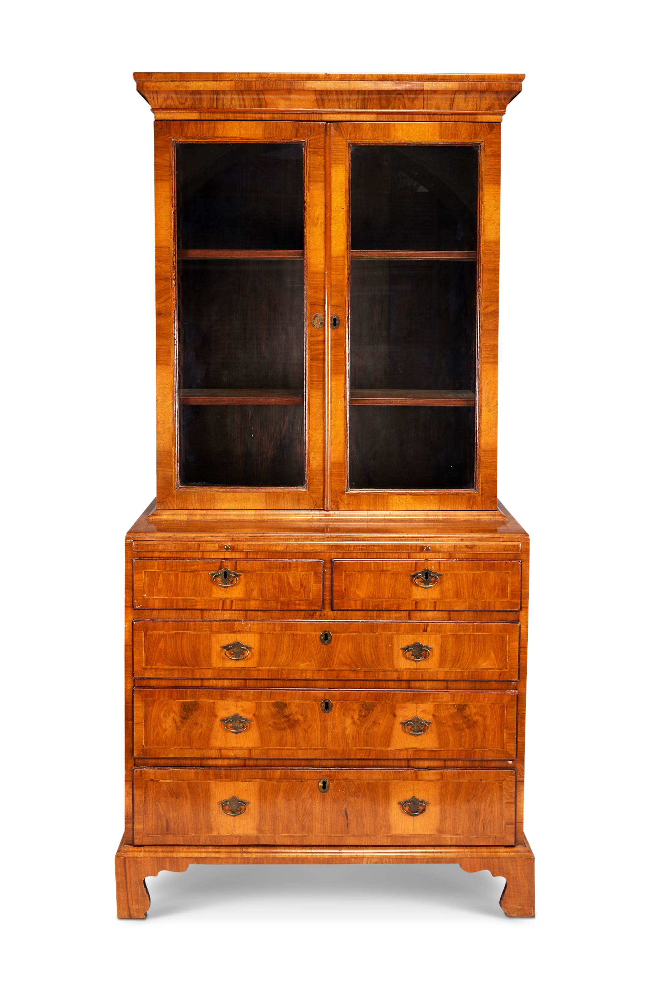 A walnut bookcase on cabinet