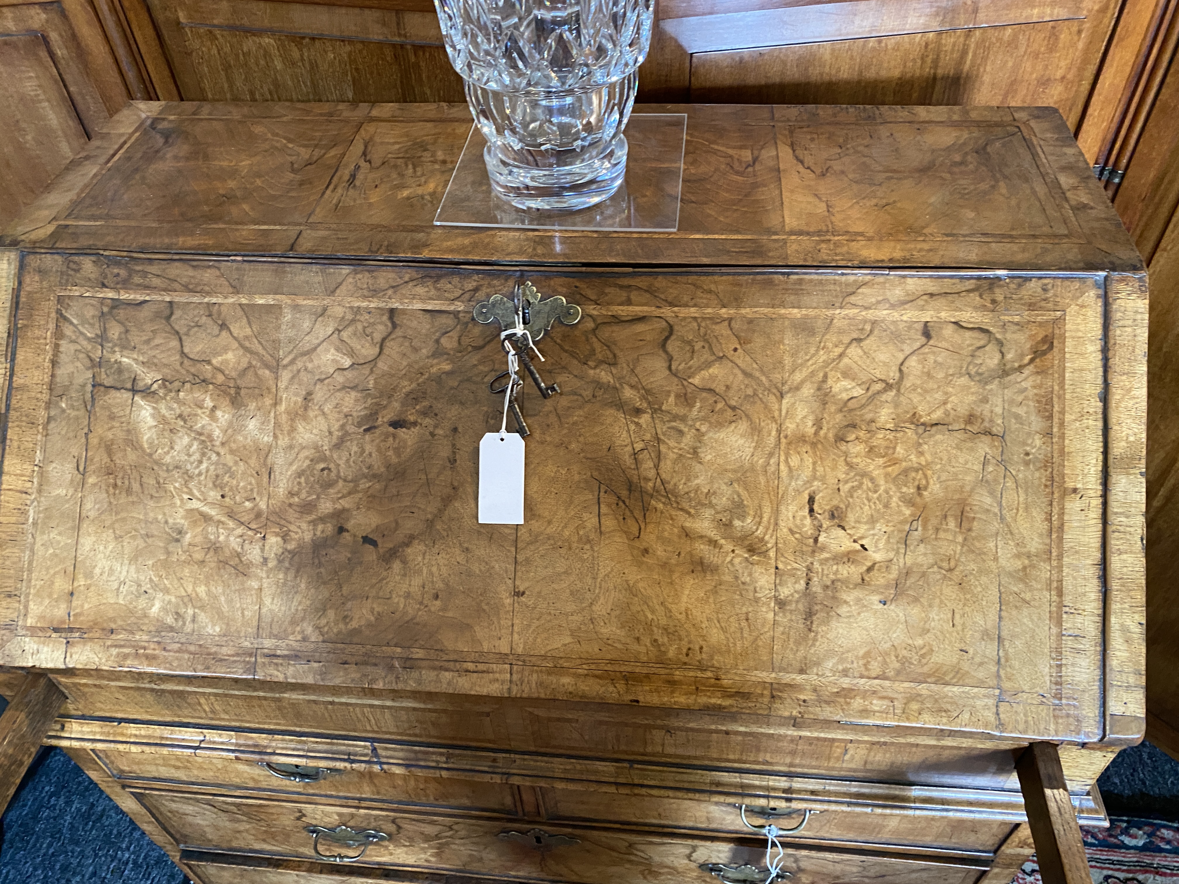 A George II walnut and featherbanded bureau - Image 25 of 33