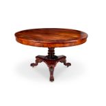 A 19th century Irish carved rosewood and crossbanded centre table