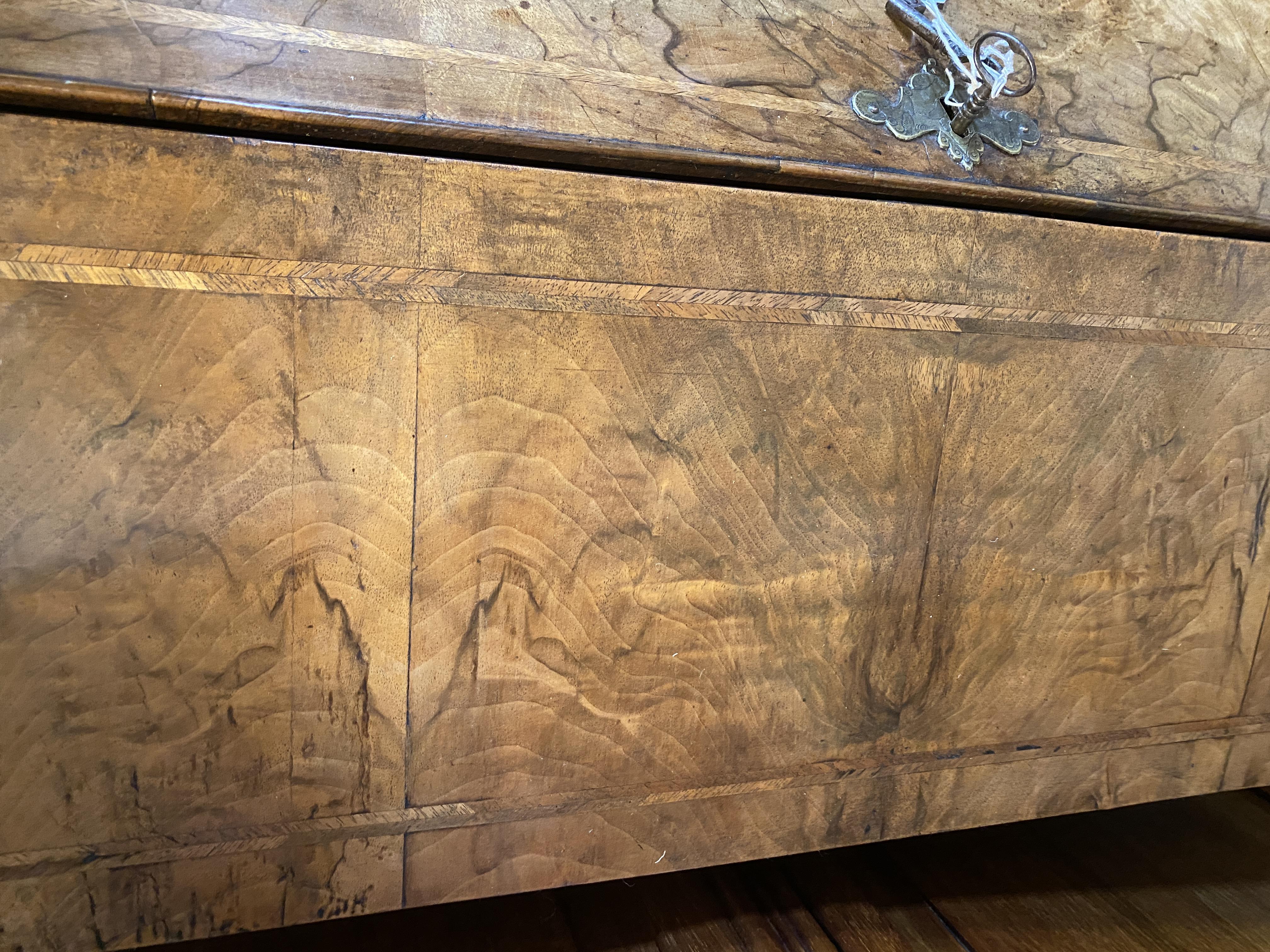 A George II walnut and featherbanded bureau - Image 12 of 33